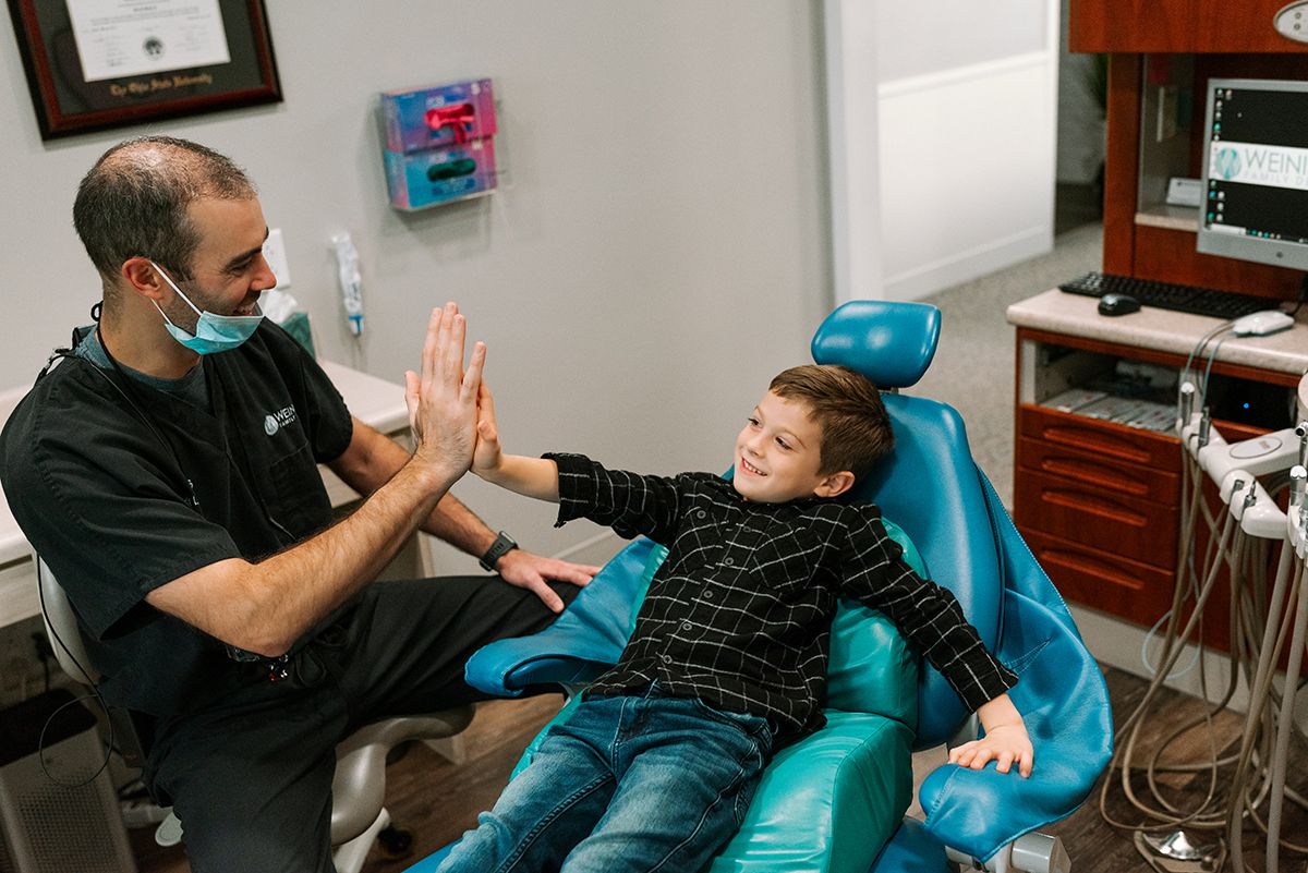 dentist and child patient